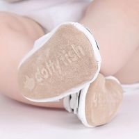 Baby girl wearing Dotty Fish soft sole baby sandals