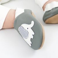 Toddler wearing soft grey Elephant leather baby shoes by Dotty Fish