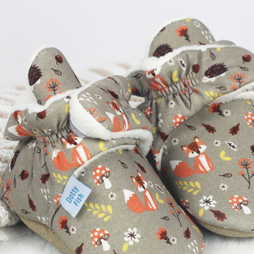 Elasticated ankles so baby booties stay on babies feet