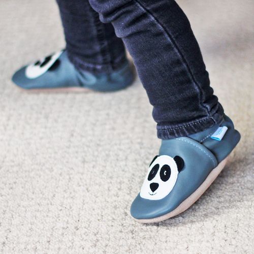 Small child wearing Pitter Patter Panda soft leather baby shoes from Dotty Fish 