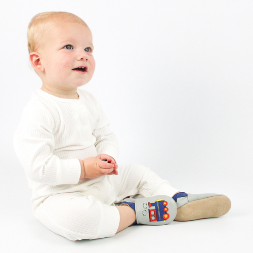 Baby boy wearing Dotty Fish choo choo train soft leather shoes with non-slip soles