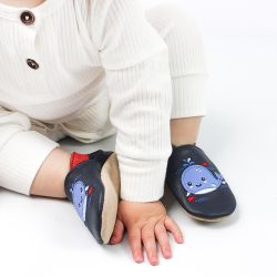 Baby wearing Splashy the whale blue leather baby shoes from Dotty Fish 