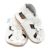 Dotty Fish white leather infant soft sole barefoot sandals with white flowers, for girls.