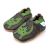 Brown Dotty Fish soft sole pre-walker shoes with green ankle trim and dinosaur design.
