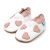 White leather Dotty Fish soft sole pre-walker shoes with pink ankle trim and pink hearts.