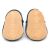Non-slip soft suede soles of Dotty Fish pre-walker shoes imprinted with Dotty Fish name and logo.