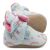 Pale blue cotton booties, with pink fleece lining and rainbow pattern.
