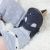 Toddler wearing navy leather Dotty Fish baby and toddler girl’s soft sole T-bar shoes.
