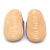 Soft suede non-slip sole of Dotty Fish infant shoes imprinted with Dotty Fish name and logo.