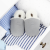 Dotty Fish pale grey slippers in drawer, with baby blankets.