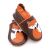 Dotty Fish brown leather soft sole unisex infant shoes with orange ankle trim and orange and white fox design.