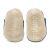Soft suede non-slip sole of Dotty Fish infant shoes imprinted with Dotty Fish name and logo.