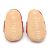 Soft suede non-slip sole of Dotty Fish infant shoes imprinted with Dotty Fish name and logo.