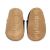 Soft suede non-slip sole of Dotty Fish infant shoes imprinted with Dotty Fish name and logo.
