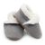 Pale grey suede Dotty Fish baby and children’s soft sole slippers with fleece lining.