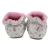 Back of cream cotton baby booties, with pink fleece lining.