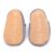 Non-slip soft suede soles of Dotty Fish pre-walker shoes imprinted with Dotty Fish name and logo.