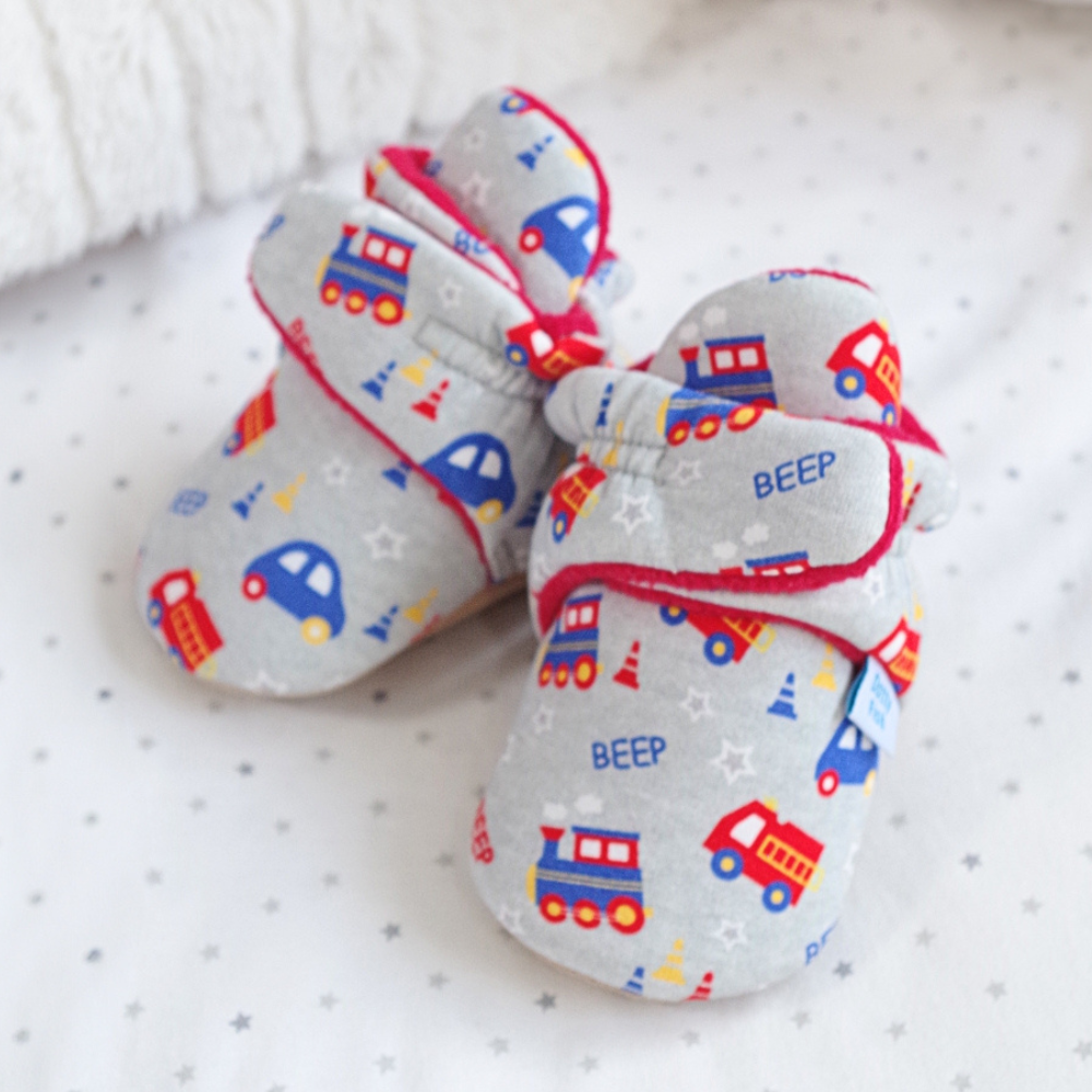 Dotty Fish cotton baby booties with fleece lining.
