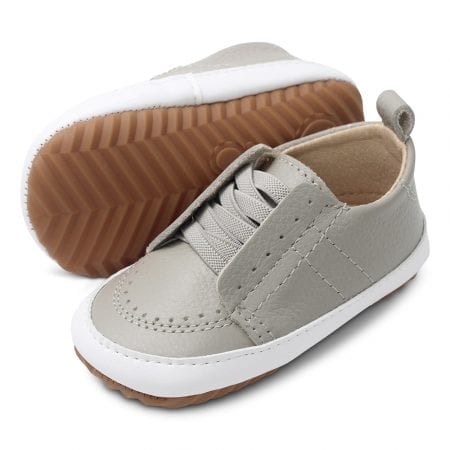 Dotty Fish light grey slip on shoes with rubber soles.